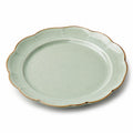Assiette plate 27 cm en céramique vert clair à bord festonné